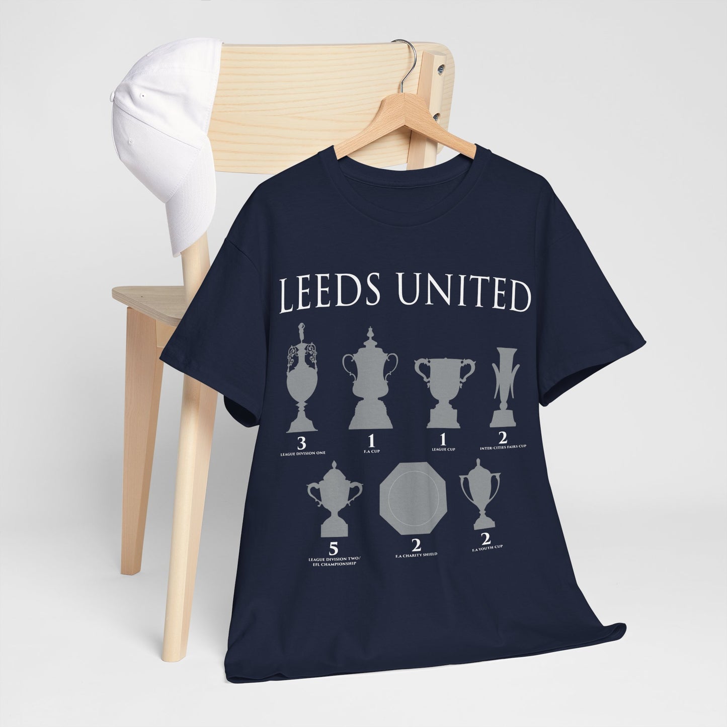 Leeds United Trophies Unisex Heavy Cotton T-Shirt - White/Black/Gold/Royal/Navy